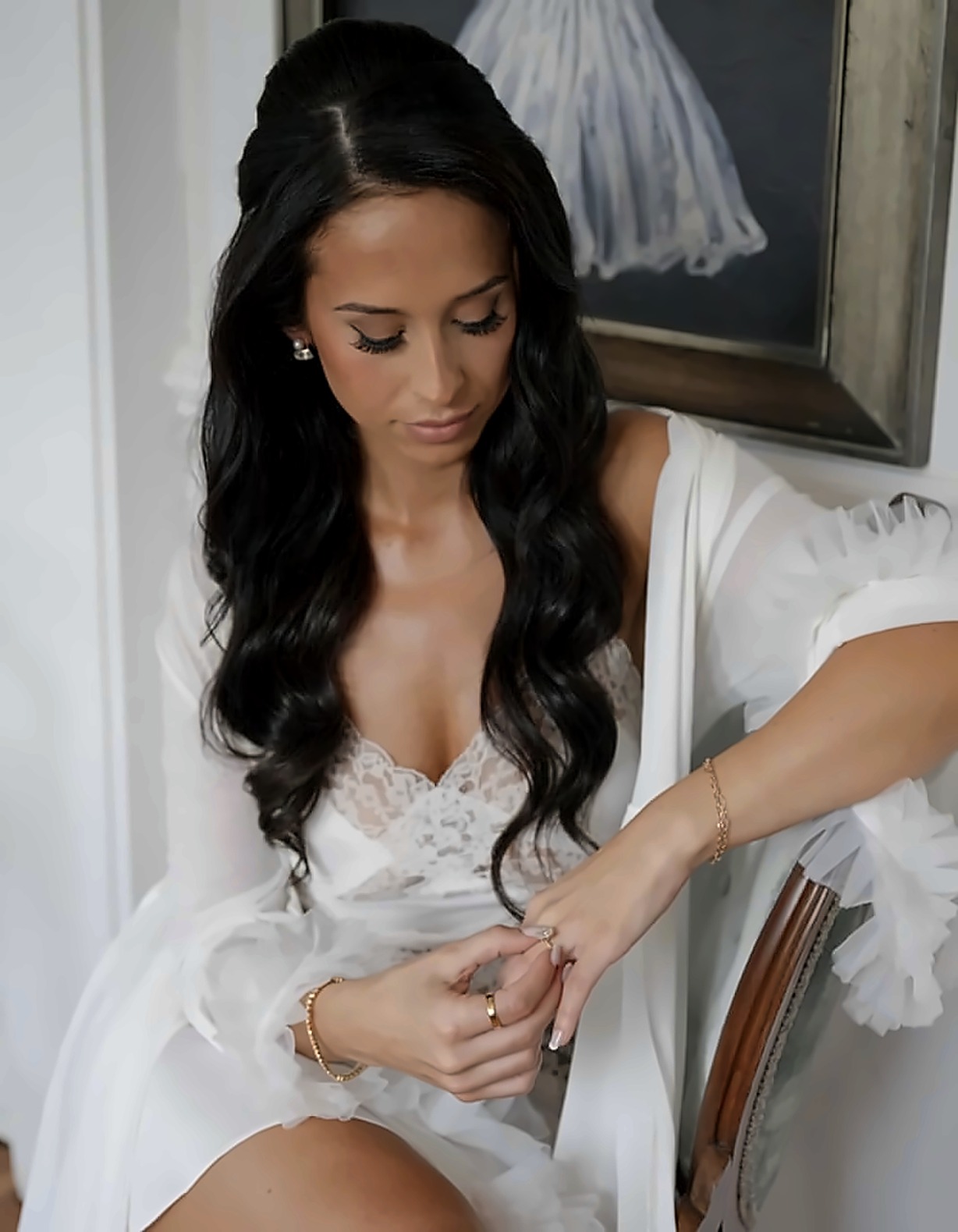 Bride with soft glam makeup and long dark curls
